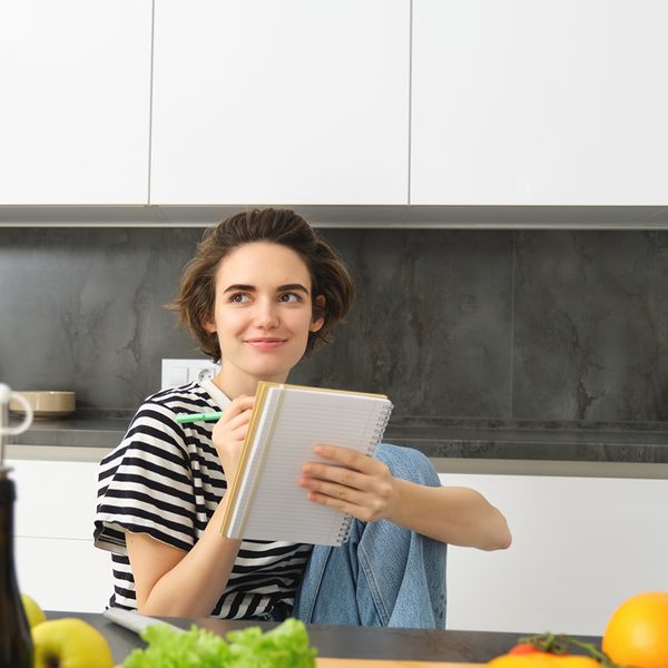 Homeowner planning a kitchen cabinet project